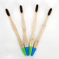Eco Shark bamboo toothbrushes with W shaped charcoal bristles and coloured tips