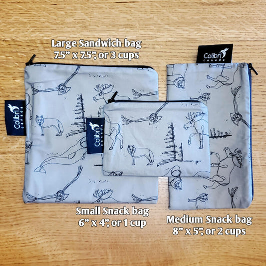 Three sizes of Canadian print zero waste reusable lunch bags for snacks and sandwiches